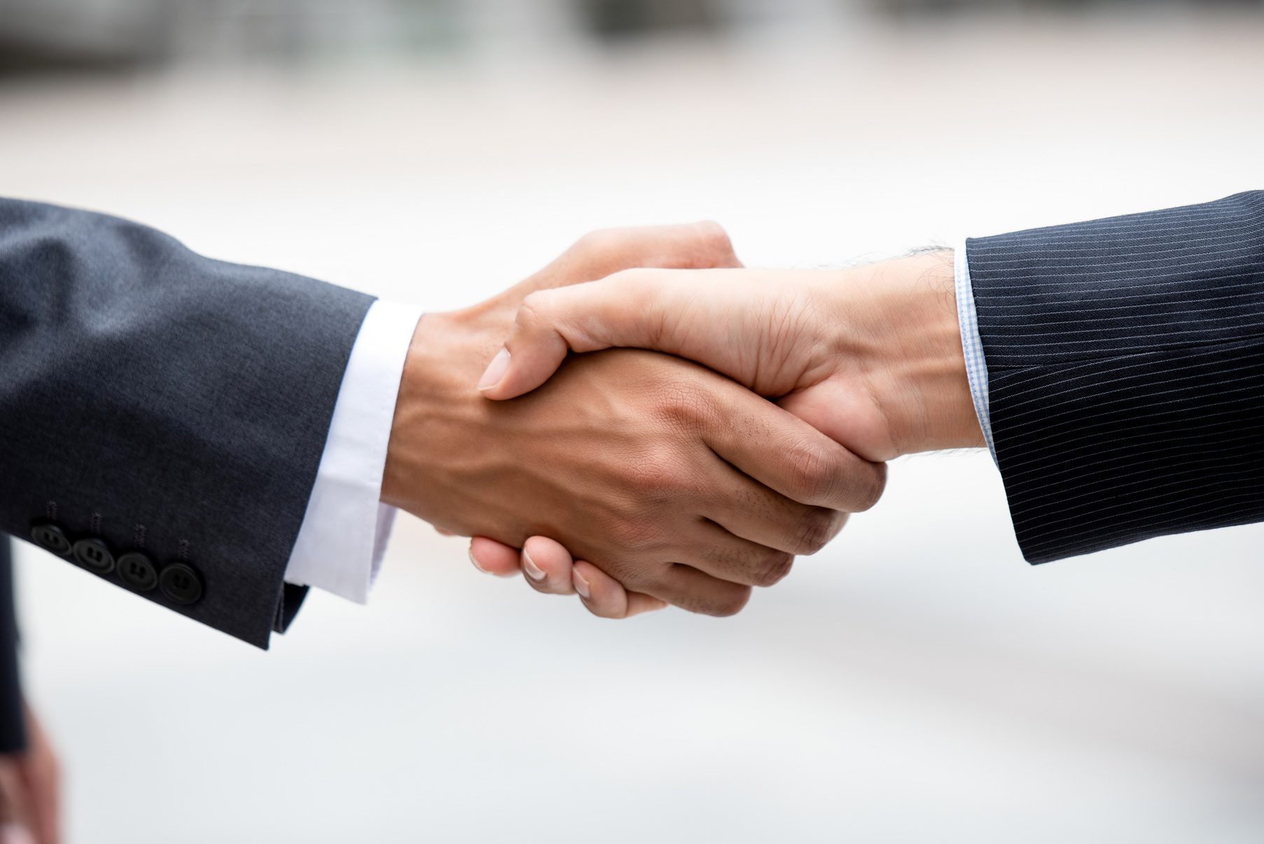 Business partners making handshake